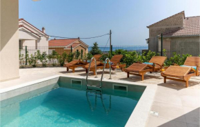 Beautiful home in Kucine with WiFi, Heated swimming pool and 4 Bedrooms